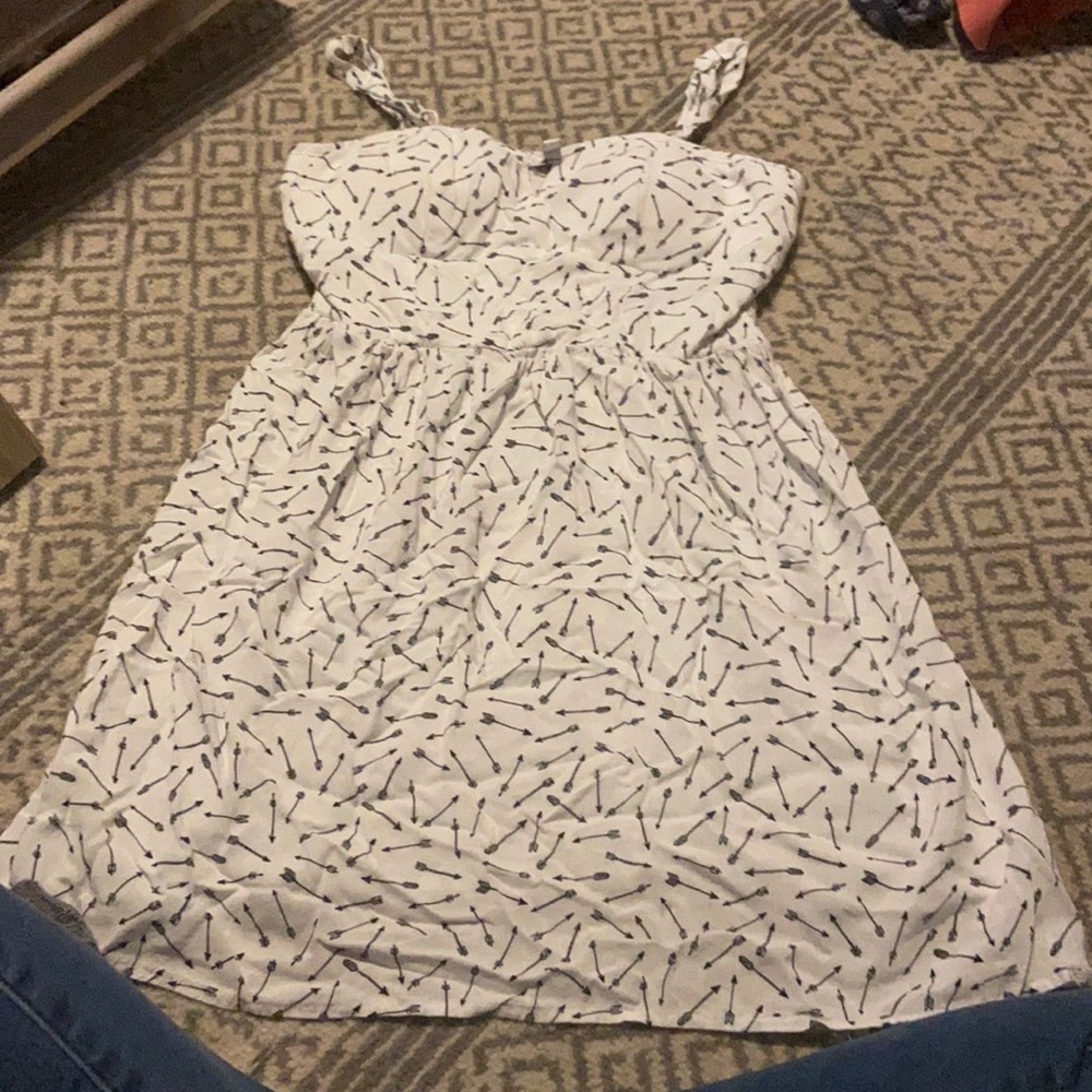 a white arrow dress.